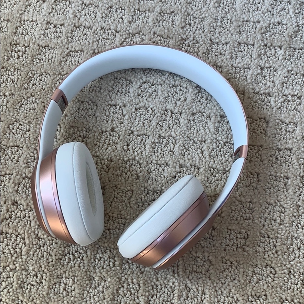 Wireless rose gold Beats headphones
